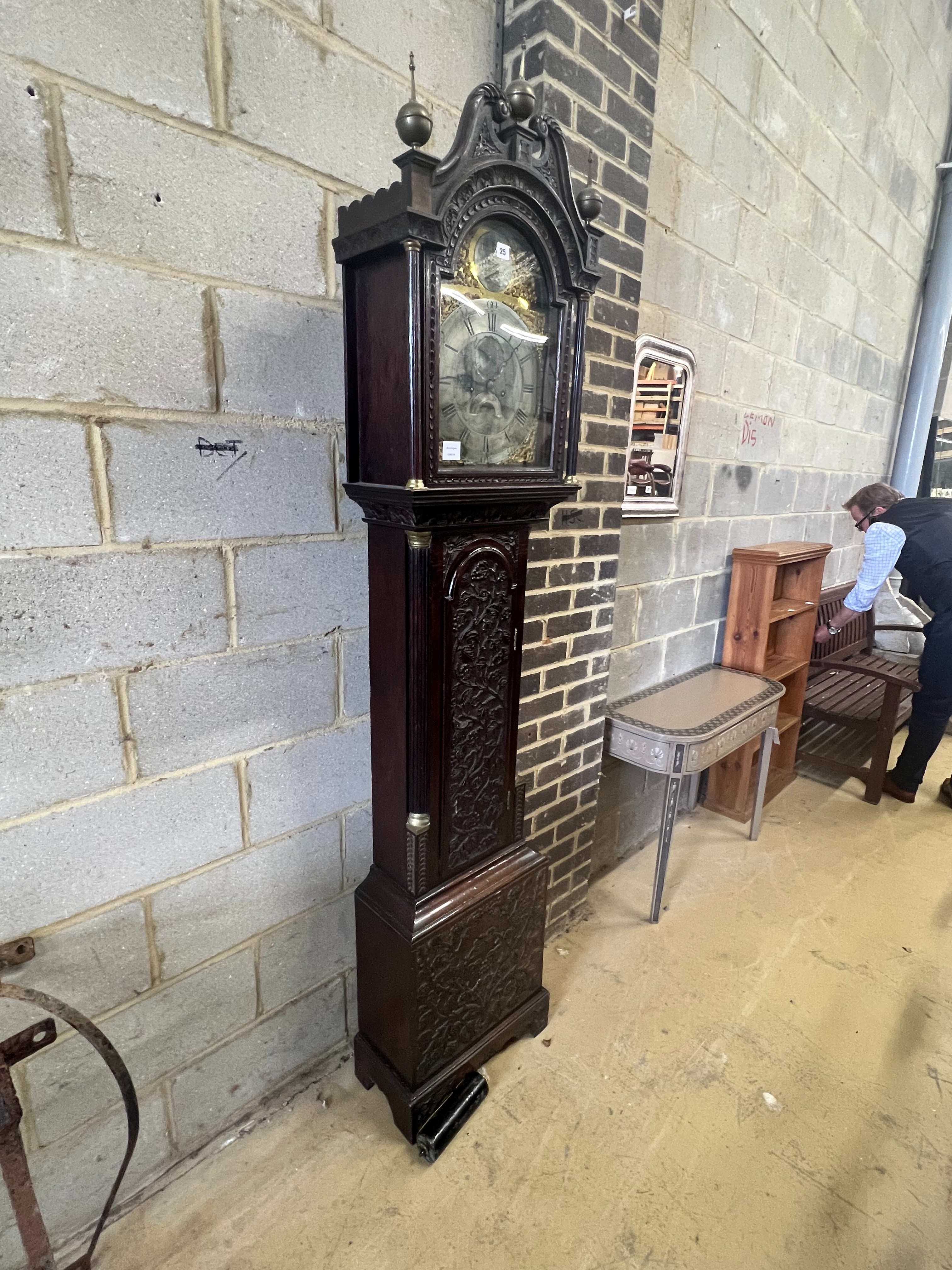 Barrett of Stowmarket. A George III carved oak eight day longcase clock, height 220cm